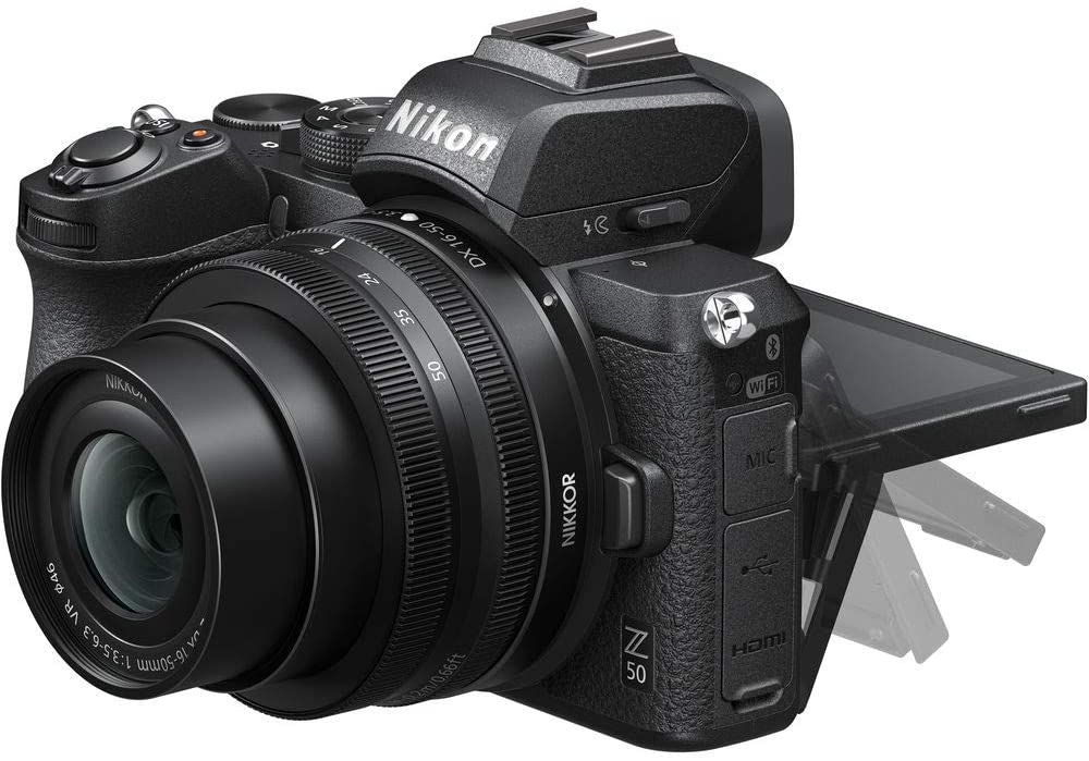 Nikon Z50 Mirrorless Digital Camera with 16-50mm Lens (1633) USA Model + Camera Bag + 46mm UV Filter + SanDisk 64GB Extreme PRO Memory Card + Hand Strap + Portable LED Video Light + More